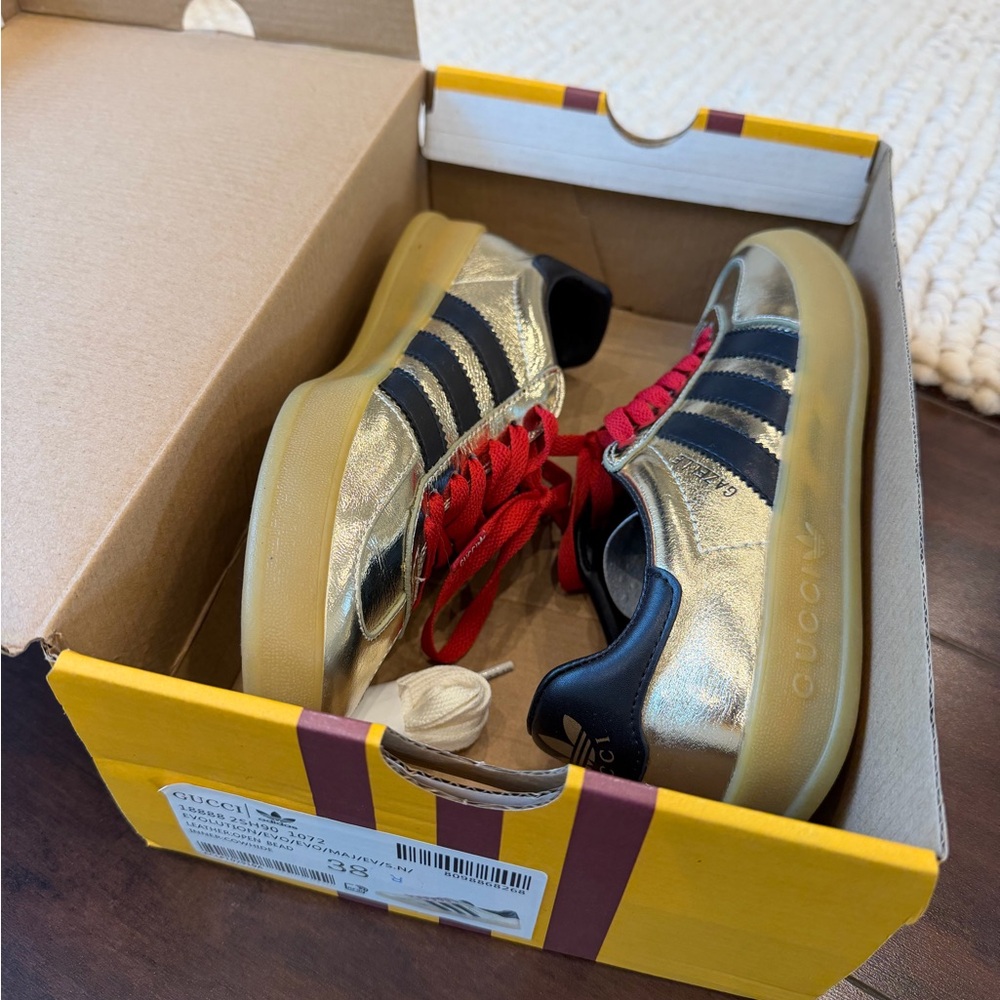 Gucci Gold and Black Sneakers with Red Accents